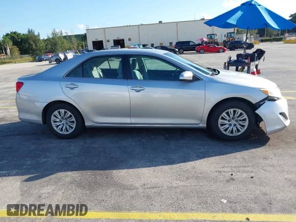 2013 Toyota Camry L with VIN 4T4BF1FK8DR291062, listed as a IAAI auction lot 43580834 with 152,864 mi miles and . Bid and sale history available at DreamBid. Image 13.