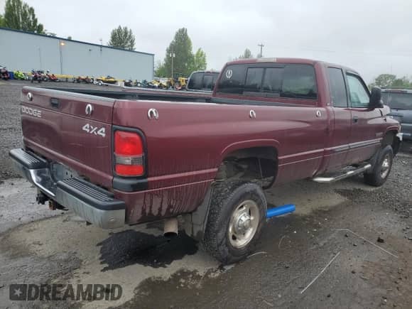 2002 Dodge 2500 with VIN 3B7KF23672M285170, listed as a Copart auction lot 58813165 with 139,892 mi miles and Salvage title. Bid and sale history available at DreamBid. Image 3.
