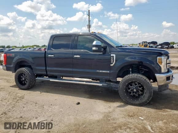 2019 Ford F-250 XL with VIN 1FT7W2BT7KED79729, listed as a Copart auction lot 71099235 with 170,854 mi miles and Salvage title. Bid and sale history available at DreamBid. Image 4.