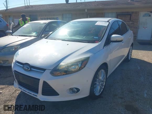 2013 Ford Focus Titanium with VIN 1FADP3J24DL167180, listed as a IAAI auction lot 43341503 with 225,042 mi miles and . Bid and sale history available at DreamBid. Image 2.