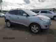 2012 Hyundai Tucson GLS with VIN KM8JUCAC0CU397835, listed as a Copart auction lot 82072965 with 69,457 mi miles and Salvage title. Bid and sale history available at DreamBid. Image 4.