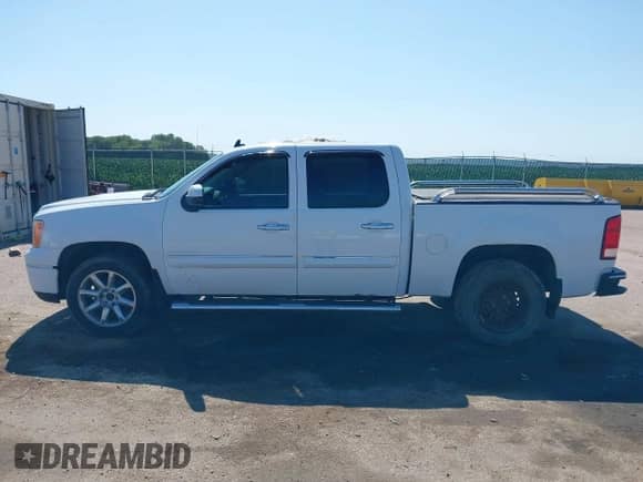 2012 GMC Sierra 1500 Denali z VIN 3GTP2XE27CG294122, wystawiony jako IAAI lot #42655182 z przebiegiem 194 073 mil mil oraz . Historia ofert i sprzedaży dostępna na DreamBid. Obrazek 14.