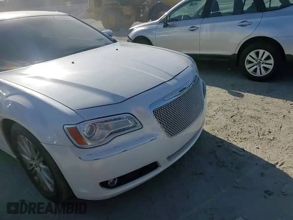 2012 Chrysler 300 C с VIN 2C3CCAKT7CH143419, выставлен на аукционе Copart как лот 46350825 с пробегом 130 839 миль миль и Списание • Salvage title. История ставок и продаж доступна на DreamBid. Изображение 11.