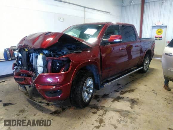 2021 Ram 1500 Laramie z VIN 1C6SRFJT0MN590694, wystawiony jako IAAI lot #38916627 z przebiegiem 69 718 mil mil oraz . Historia ofert i sprzedaży dostępna na DreamBid. Obrazek 2.