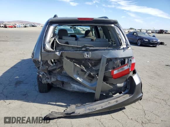 2007 Honda Odyssey EX z VIN 5FNRL384X7B103283, wystawiony jako Copart lot #69881675 z przebiegiem Nie podano mil oraz Szkoda całkowita • Salvage title. Historia ofert i sprzedaży dostępna na DreamBid. Obrazek 6.