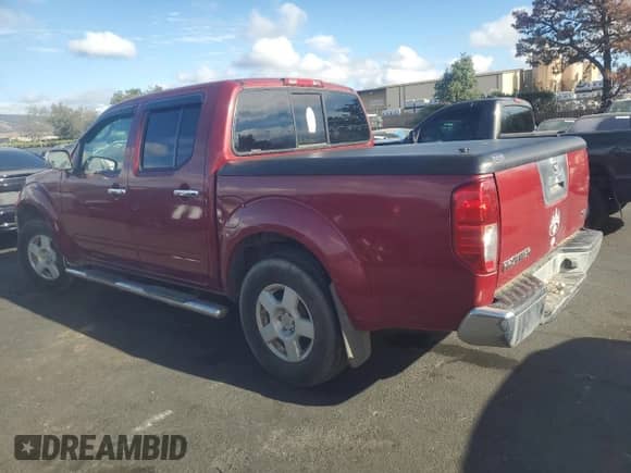 2006 Nissan Frontier SE with VIN 1N6AD07UX6C421343, listed as a Copart auction lot 81951935 with 216,374 mi miles and Salvage title. Bid and sale history available at DreamBid. Image 2.
