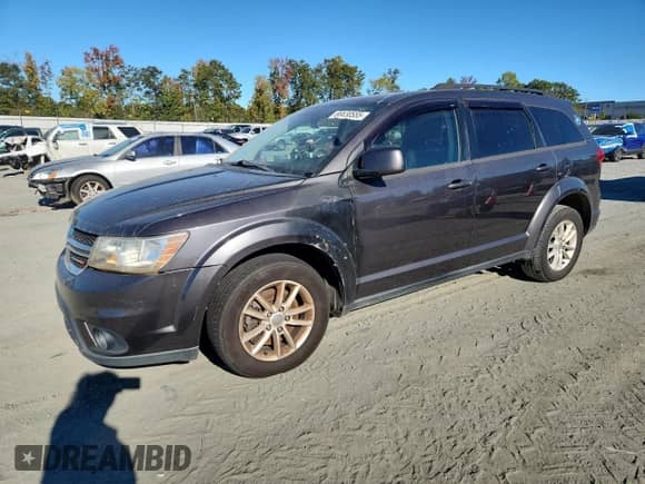 2016 Dodge Journey SXT with VIN 3C4PDCBGXGT127141, listed as a Copart auction lot 86530555 with 143,719 mi miles and Clean title. Bid and sale history available at DreamBid. Image 1.