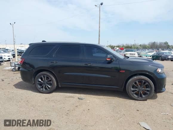 2020 Dodge Durango R/T with VIN 1C4SDHCT8LC410596, listed as a IAAI auction lot 41620792 with 62,985 mi miles and . Bid and sale history available at DreamBid. Image 12.