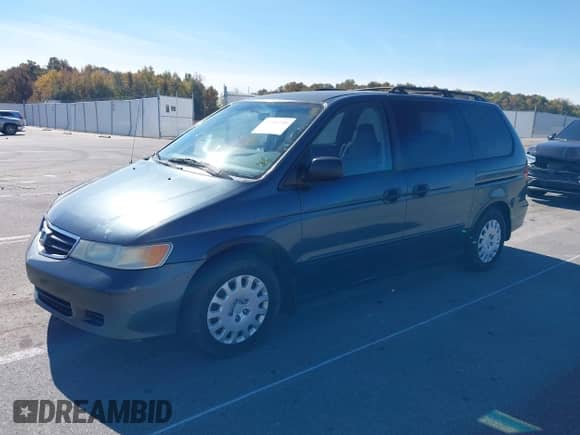 2003 Honda Odyssey LX with VIN 5FNRL18503B121136, listed as a IAAI auction lot 43501755 with 262,481 mi miles and . Bid and sale history available at DreamBid. Image 2.