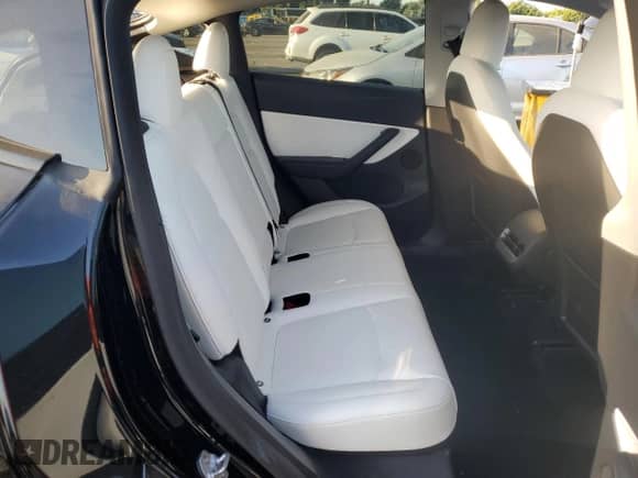 2022 Tesla Model Y Performance with VIN 7SAYGDEF9NF393852, listed as a Copart auction lot 63141094 with 26,972 mi miles and Salvage title. Bid and sale history available at DreamBid. Image 10.