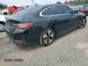 2023 BMW i4 eDrive35 with VIN WBY43AW0XPFP92914, listed as a Copart auction lot 66748865 with 32,088 mi miles and Salvage title. Bid and sale history available at DreamBid. Image 3.