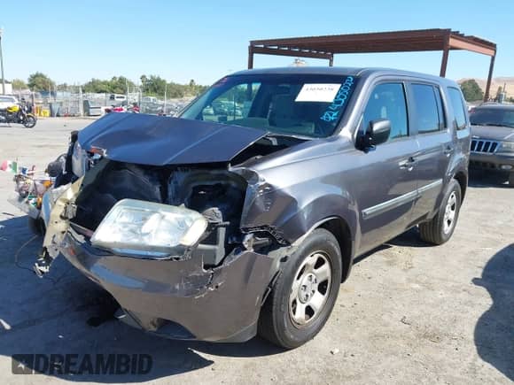 2015 Honda Pilot LX with VIN 5FNYF3H21FB015772, listed as a IAAI auction lot 43050238 with 145,107 mi miles and . Bid and sale history available at DreamBid. Image 2.