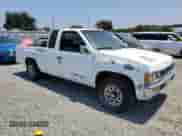 1995 Nissan Frontier XE z VIN 1N6HD16S9SC460861, wystawiony jako Copart lot #59061935 z przebiegiem 176 214 mil mil oraz Czysty tytuł • Clean title. Historia ofert i sprzedaży dostępna na DreamBid. Obrazek 4.