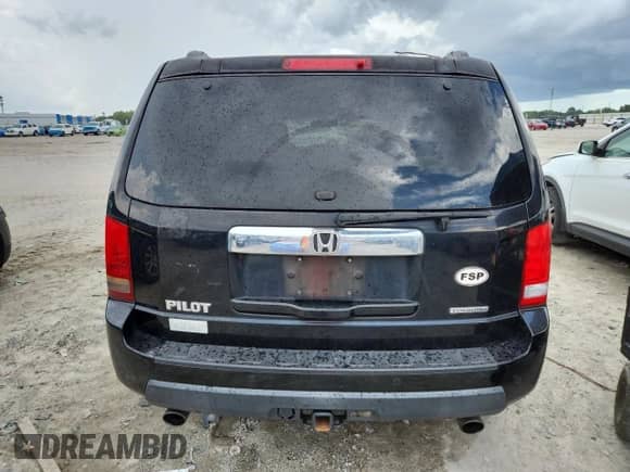 2010 Honda Pilot Touring z VIN 5FNYF3H95AB020303, wystawiony jako Copart lot #63252465 z przebiegiem 236 386 mil mil oraz Czysty tytuł • Clean title. Historia ofert i sprzedaży dostępna na DreamBid. Obrazek 6.