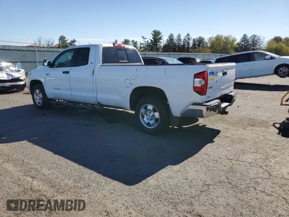 2016 Toyota Tundra SR with VIN 5TFCY5F1XGX020292, listed as a Copart auction lot 87105715 with 121,822 mi miles and Salvage title. Bid and sale history available at DreamBid. Image 2.