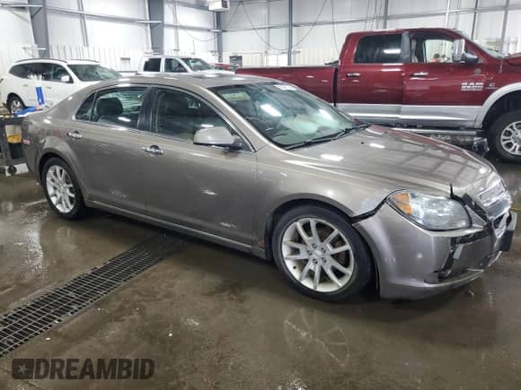 2012 Chevrolet Malibu LTZ 1LZ with VIN 1G1ZE5E07CF192008, listed as a Copart auction lot 65925105 with 194,712 mi miles and Salvage title. Bid and sale history available at DreamBid. Image 4.
