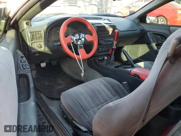 1997 Chevrolet Camaro Z28 z VIN 2G1FP22P5V2113601, wystawiony jako Copart lot #78089904 z przebiegiem 163 715 mil mil oraz Czysty tytuł • Clean title. Historia ofert i sprzedaży dostępna na DreamBid. Obrazek 8.