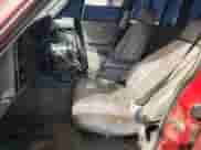 1991 Jeep Grand Cherokee with VIN 1J4FJ88S8ML629144, listed as a Copart auction lot 71988814 with 185,129 mi miles and Salvage title. Bid and sale history available at DreamBid. Image 7.