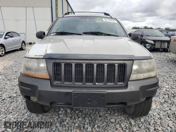 2004 Jeep Grand Cherokee Laredo with VIN 1J4GX48S04C301566, listed as a Copart auction lot 86159575 with 195,483 mi miles and Salvage title. Bid and sale history available at DreamBid. Image 5.