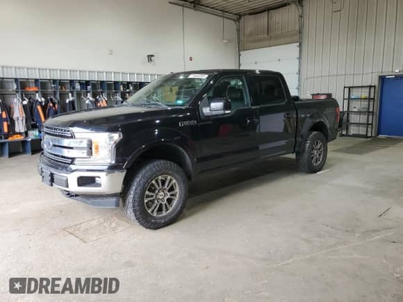 2018 Ford F-150 Lariat with VIN 1FTEW1E55JFC64487, listed as a Copart auction lot 71464255 with 105,578 mi miles and Salvage title. Bid and sale history available at DreamBid. Image 1.