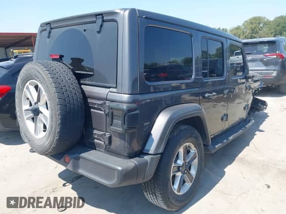 2021 Jeep Wrangler Unlimited Sahara with VIN 1C4HJXEG3MW695849, listed as a IAAI auction lot 43196794 with 62,748 mi miles and . Bid and sale history available at DreamBid. Image 4.