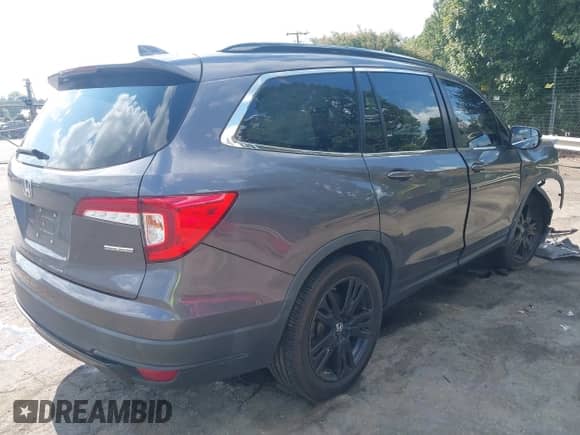 2021 Honda Pilot Special Edition z VIN 5FNYF5H24MB034504, wystawiony jako IAAI lot #43161111 z przebiegiem Nie podano mil oraz . Historia ofert i sprzedaży dostępna na DreamBid. Obrazek 4.