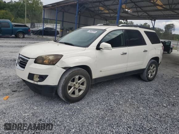 2007 Saturn Outlook XR with VIN 5GZER23787J101418, listed as a Copart auction lot 70452555 with 385,954 mi miles and Salvage title. Bid and sale history available at DreamBid. Image 1.