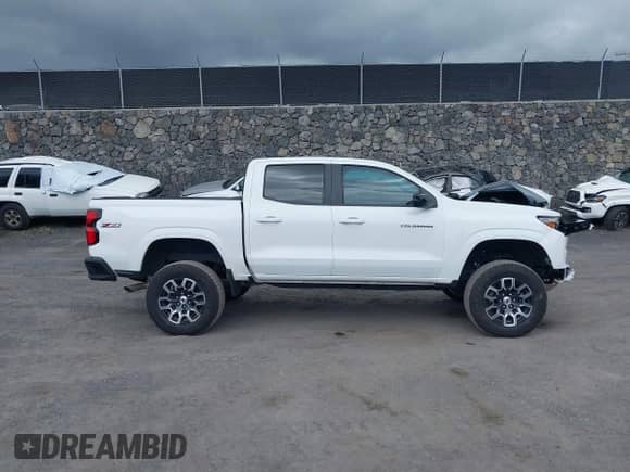 2023 Chevrolet Colorado 4WD Z71 with VIN 1GCPTDEK9P1219177, listed as a IAAI auction lot 42226373 with 26,238 mi miles and . Bid and sale history available at DreamBid. Image 13.