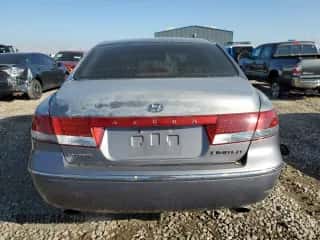 2006 Hyundai Azera SE с VIN KMHFC46F56A123232, выставлен на аукционе Copart как лот 88720625 с пробегом 170 833 миль миль и Списание • Salvage title. История ставок и продаж доступна на DreamBid. Изображение 6.