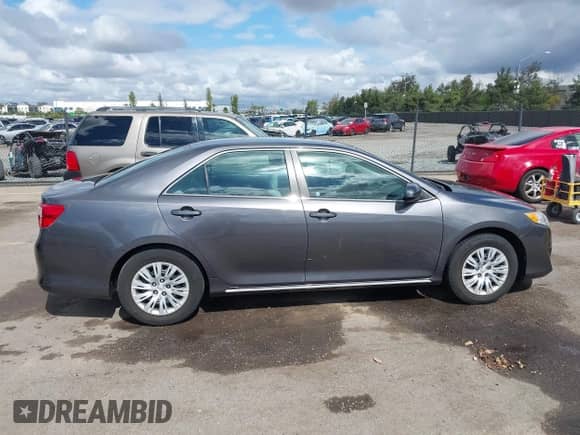 2014 Toyota Camry LE with VIN 4T4BF1FK3ER398117, listed as a IAAI auction lot 43458286 with 56,946 mi miles and . Bid and sale history available at DreamBid. Image 13.