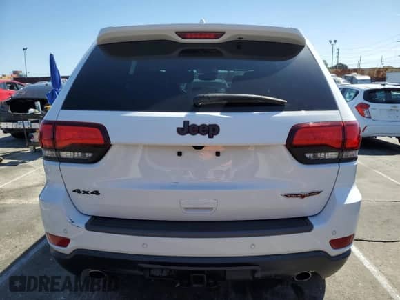 2021 Jeep Grand Cherokee Trailhawk z VIN 1C4RJFLG5MC565316, wystawiony jako Copart lot #60751955 z przebiegiem 69 261 mil mil oraz Szkoda całkowita • Salvage title. Historia ofert i sprzedaży dostępna na DreamBid. Obrazek 6.