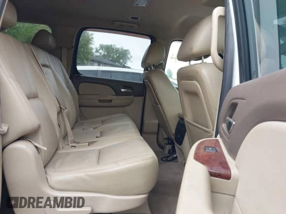 2010 Chevrolet Suburban LT with VIN 1GNUKJE32AR113764, listed as a IAAI auction lot 43277102 with 297,432 mi miles and . Bid and sale history available at DreamBid. Image 8.
