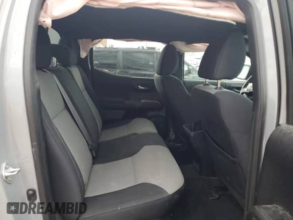 2021 Toyota Tacoma SR with VIN 3TMCZ5AN5MM418762, listed as a Copart auction lot 66169995 with 73,465 mi miles and Salvage title. Bid and sale history available at DreamBid. Image 10.