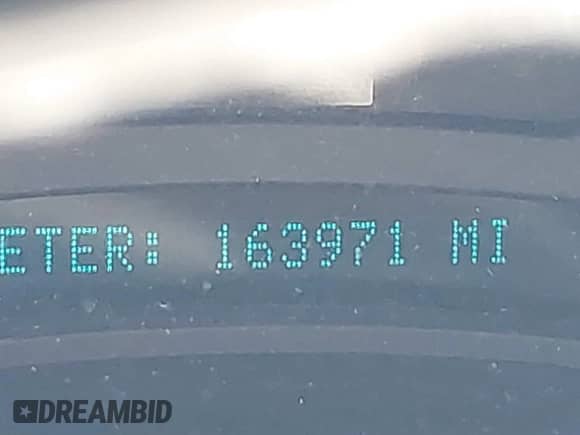 2003 Chevrolet Tahoe LT z VIN 1GNEK13Z03J220146, wystawiony jako IAAI lot #43533236 z przebiegiem 163 971 mil mil oraz . Historia ofert i sprzedaży dostępna na DreamBid. Obrazek 7.