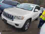 2012 Jeep Grand Cherokee Laredo z VIN 1C4RJFAG2CC248790, wystawiony jako IAAI lot #43563104 z przebiegiem 162 187 mil mil oraz . Historia ofert i sprzedaży dostępna na DreamBid. Obrazek 2.