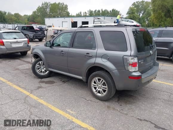 2010 Mercury Mariner Premier with VIN 4M2CN9H70AKJ30462, listed as a IAAI auction lot 43264181 with 169,789 mi miles and . Bid and sale history available at DreamBid. Image 3.