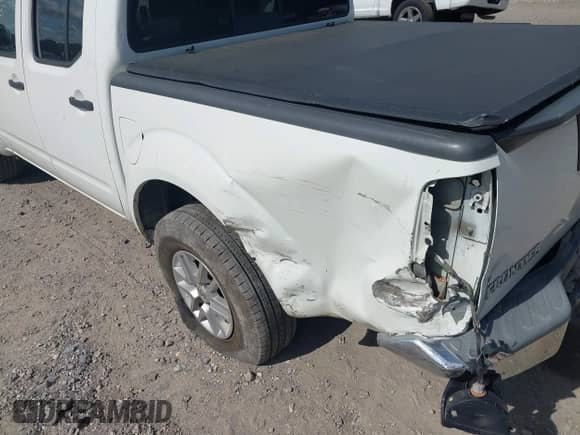 2016 Nissan Frontier SV z VIN 1N6AD0EV5GN795909, wystawiony jako IAAI lot #43356457 z przebiegiem 148 664 mil mil oraz . Historia ofert i sprzedaży dostępna na DreamBid. Obrazek 17.