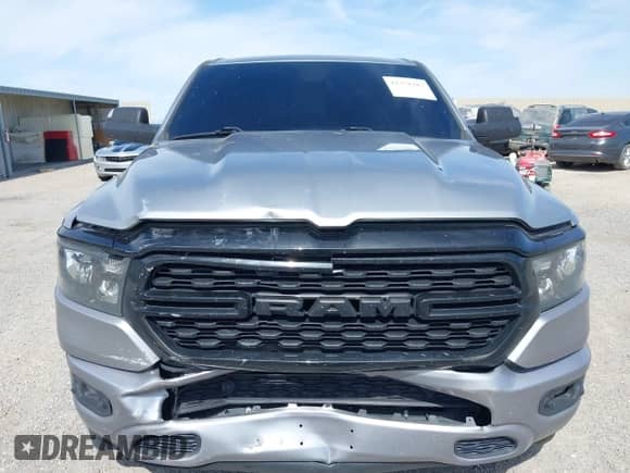 2022 Ram 1500 Big Horn z VIN 1C6RREFT3NN157681, wystawiony jako IAAI lot #42358287 z przebiegiem 106 659 mil mil oraz . Historia ofert i sprzedaży dostępna na DreamBid. Obrazek 12.