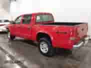 2004 Dodge Dakota SLT with VIN 1D7HG48N44S733366, listed as a IAAI auction lot 42319470 with 156,798 mi miles and . Bid and sale history available at DreamBid. Image 3.