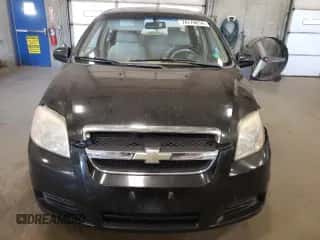 2007 Chevrolet Aveo LT z VIN KL1TG566X7B054185, wystawiony jako Copart lot #74776014 z przebiegiem 152 148 mil mil oraz Szkoda całkowita • Salvage title. Historia ofert i sprzedaży dostępna na DreamBid. Obrazek 5.
