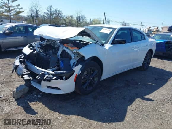 2023 Dodge Charger SXT z VIN 2C3CDXJG9PH636755, wystawiony jako IAAI lot #41996030 z przebiegiem 16 827 mil mil oraz . Historia ofert i sprzedaży dostępna na DreamBid. Obrazek 2.