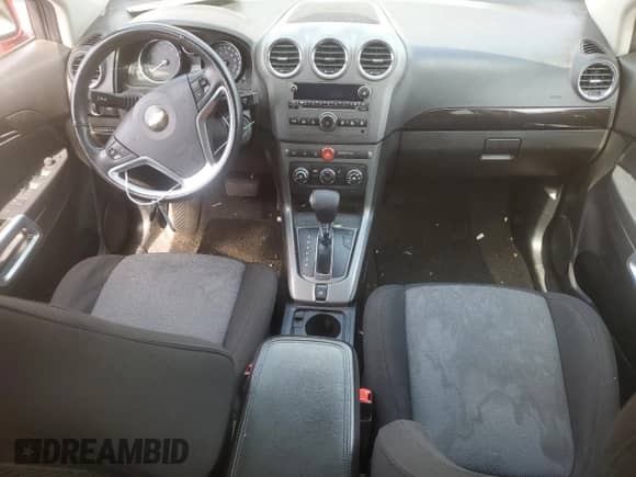 2015 Chevrolet Captiva Sport LS с VIN 3GNAL2EK9FS523883, выставлен на аукционе Copart как лот 55262104 с пробегом 93 162 миль миль и Списание • Salvage title. История ставок и продаж доступна на DreamBid. Изображение 8.