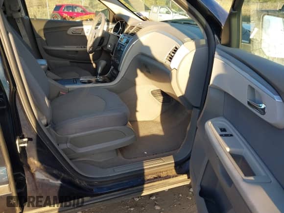 2012 Chevrolet Traverse LS with VIN 1GNKRFED3CJ163454, listed as a IAAI auction lot 43430090 with 123,283 mi miles and . Bid and sale history available at DreamBid. Image 5.