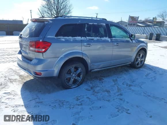 2017 Dodge Journey Crossroad z VIN 3C4PDCGG4HT594615, wystawiony jako IAAI lot #41411333 z przebiegiem 122 810 mil mil oraz . Historia ofert i sprzedaży dostępna na DreamBid. Obrazek 4.