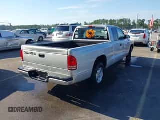 2001 Dodge Dakota with VIN 1B7GL22X21S121968, listed as a IAAI auction lot 43317250 with 163,485 mi miles and . Bid and sale history available at DreamBid. Image 4.