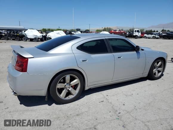 2006 Dodge Charger SRT-8 with VIN 2B3KA73W86H369838, listed as a Copart auction lot 52767384 with 165,630 mi miles and Salvage title. Bid and sale history available at DreamBid. Image 3.