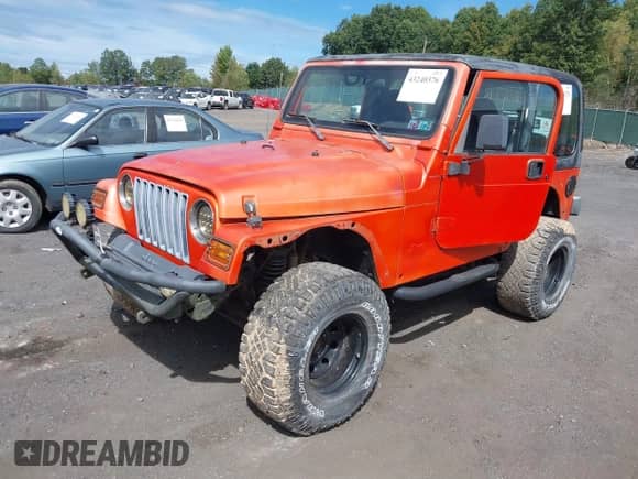 2002 Jeep Wrangler X z VIN 1J4FA39S22P731157, wystawiony jako IAAI lot #43240376 z przebiegiem 154 782 mil mil oraz . Historia ofert i sprzedaży dostępna na DreamBid. Obrazek 2.