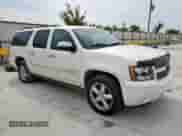 2014 Chevrolet Suburban LTZ with VIN 1GNSKKE79ER231994, listed as a Copart auction lot 71830095 with 152,865 mi miles and Clean title. Bid and sale history available at DreamBid. Image 4.