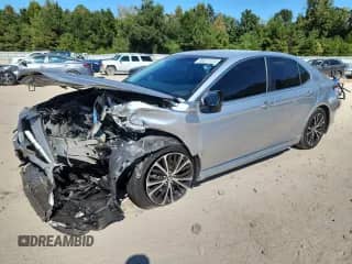 2018 Toyota Camry SE с VIN 4T1B11HK2JU048056, выставлен на аукционе Copart как лот 86617475 с пробегом 181 528 миль миль и Списание • Salvage title. История ставок и продаж доступна на DreamBid. Изображение 1.