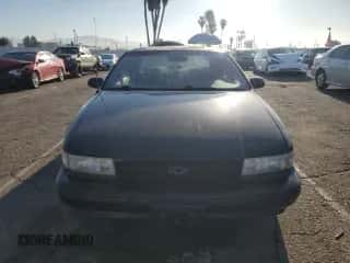 1995 Chevrolet Caprice с VIN 1G1BL52P5SR174158, выставлен на аукционе Copart как лот 50378315 с пробегом 220 515 миль миль и Списание • Salvage title. История ставок и продаж доступна на DreamBid. Изображение 5.